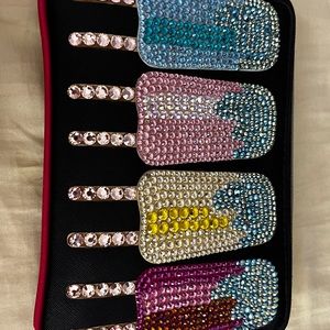 Betsy Johnson used blinged wristlet